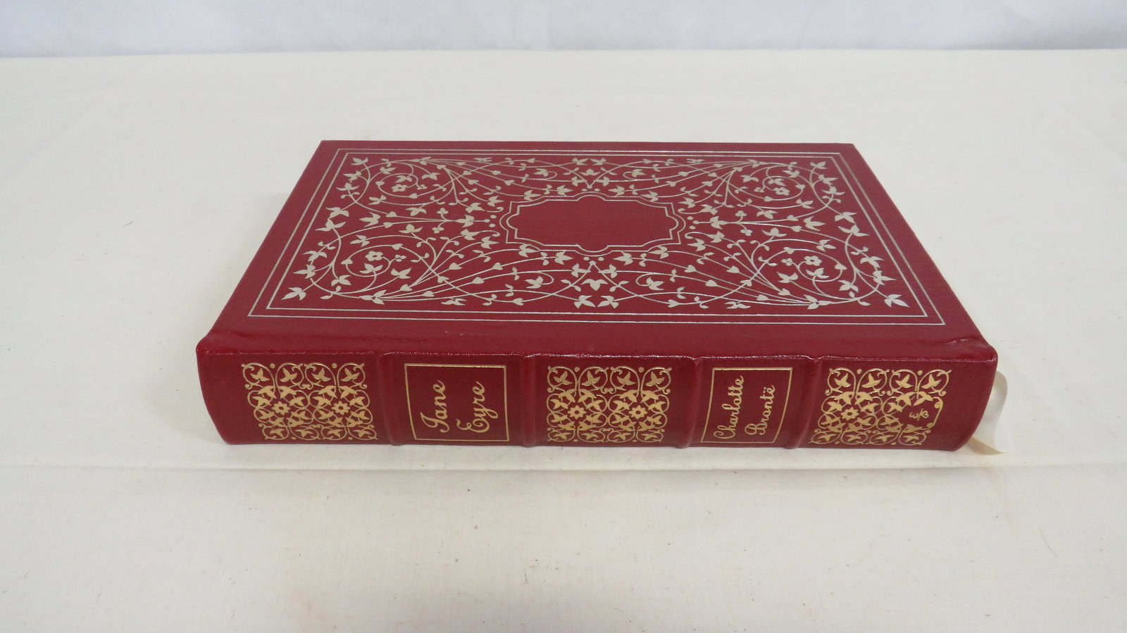 Easton Press Jane Eyre Leather Bound Book: Easton Press Jane Eyre Leather Bound Book. Full leather binding with ornate gilded designs and illustrated plates. Good condition with some rubbing on back cover. 9.25" x 6"