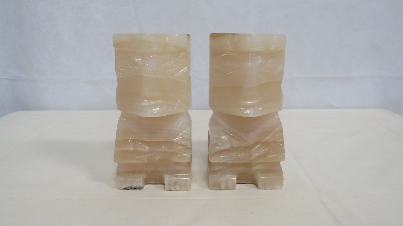 Vintage Mid Century Carved Mayan Onyx Bookends: Vintage Mid Century Carved Mayan Onyx Bookends in good condition. 7"H x 3.5"L x 2.25"W