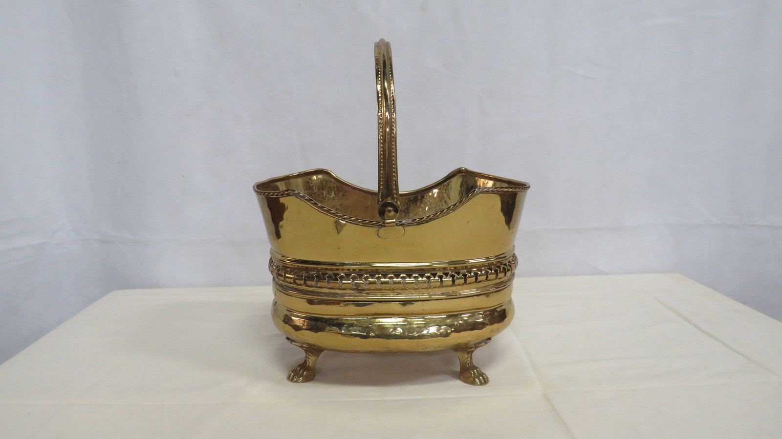 Vintage Solid Brass Paw Foot Planter Basket: Vintage Solid Brass Paw Foot Planter Basket in good condition. 13" H x 11"L x 7.5"W