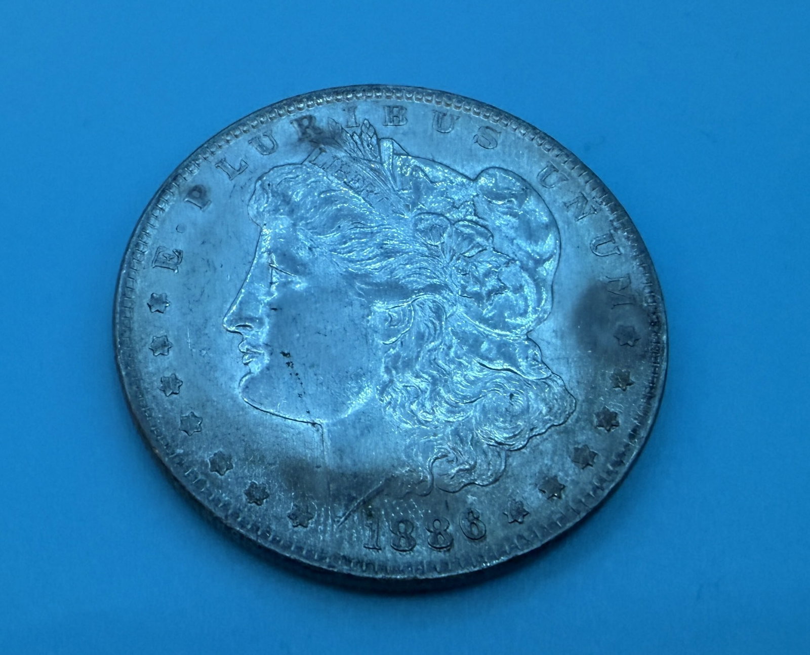 1886 Morgan Silver Dollar: 1886 Morgan Silver Dollar in circulated condition