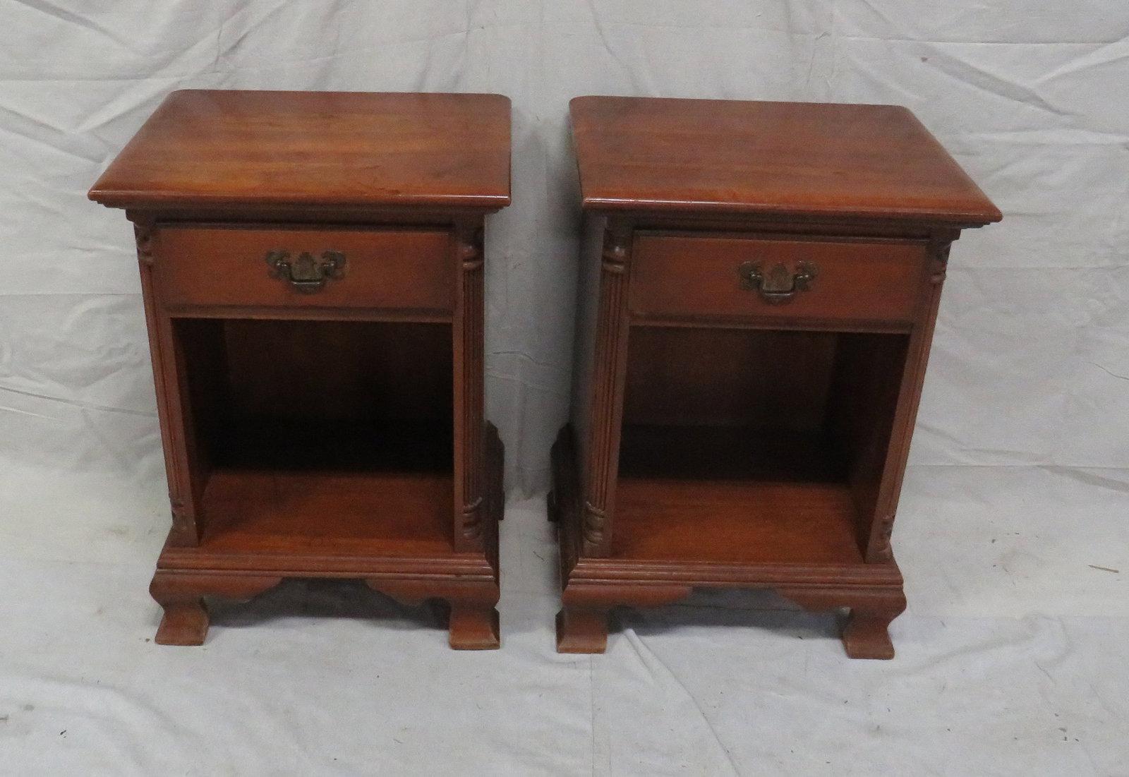 Pair of Cherry Traditional One Drawer Nightstands: Pair of Cherry Traditional One Drawer Nightstands in good condition, Some Blemishes to tops, Dovetailed Drawers, Column Front, 26.5''H x 19''W x 15.5''D