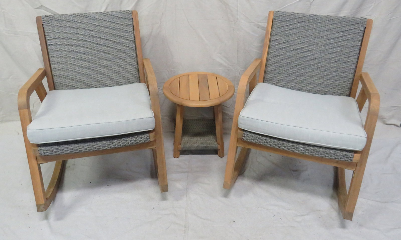 Nautica Lounge Set Rockers & Table: Nautica Lounge Set Rockers & Table in good condition. Woven all weather seats and backs with seat cushions included. Rocking chair measures 34"H x 26"W x 33"D