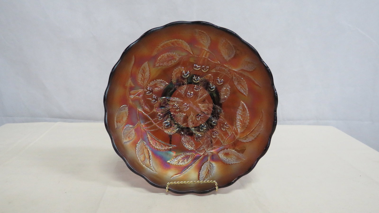 Millersburg Amethyst Hanging Cherry Carnival Bowl: Millersburg Amethyst Hanging Cherry Carnival Bowl in good condition. Scalloped edge bowl with Hanging Cherries pattern. Amethyst color with iridescence. 2.5"H x 9.5"D