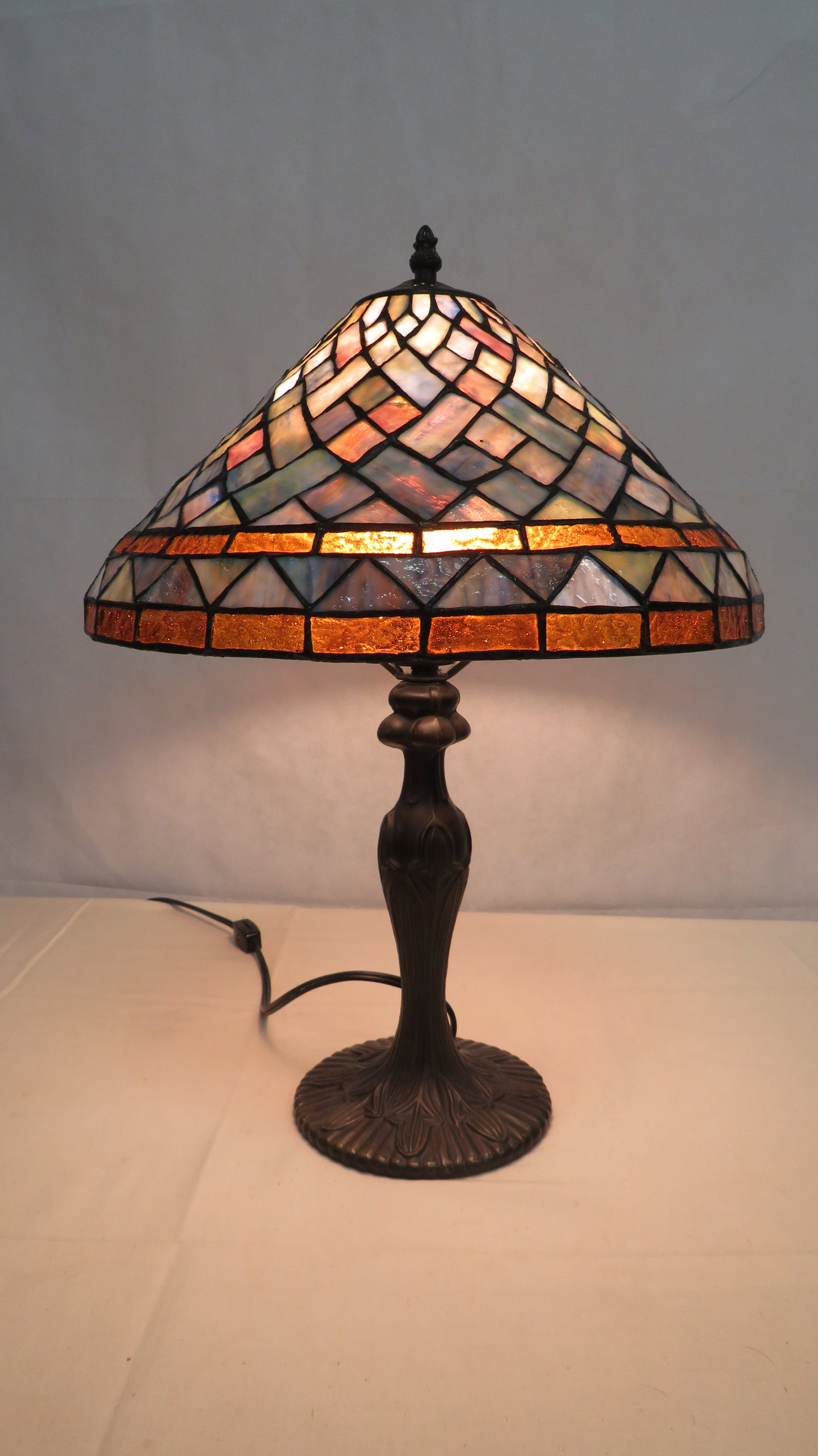 Tiffany Style Stained Glass Table Lamp: Tiffany Style Stained Glass Table Lamp in good condition. 20" tall with 14.5" diameter shade.