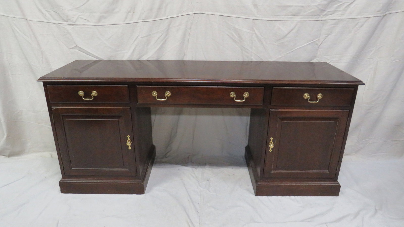 Vintage Cherry Stickley Desk: Vintage Cherry Stickley Desk in good condition, shows signs of use, Dovetailed Drawers, Brass Hardware, 31''H x 72''W x 20''D