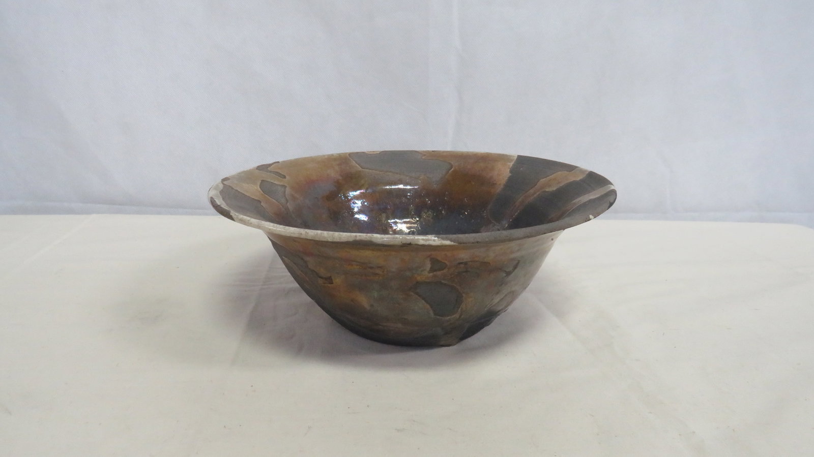 Vintage Large Raku Studio Art Pottery Bowl: Vintage Large Raku Studio Art Pottery Bowl in good condition. Artist signed. 3.75"H x 10"D