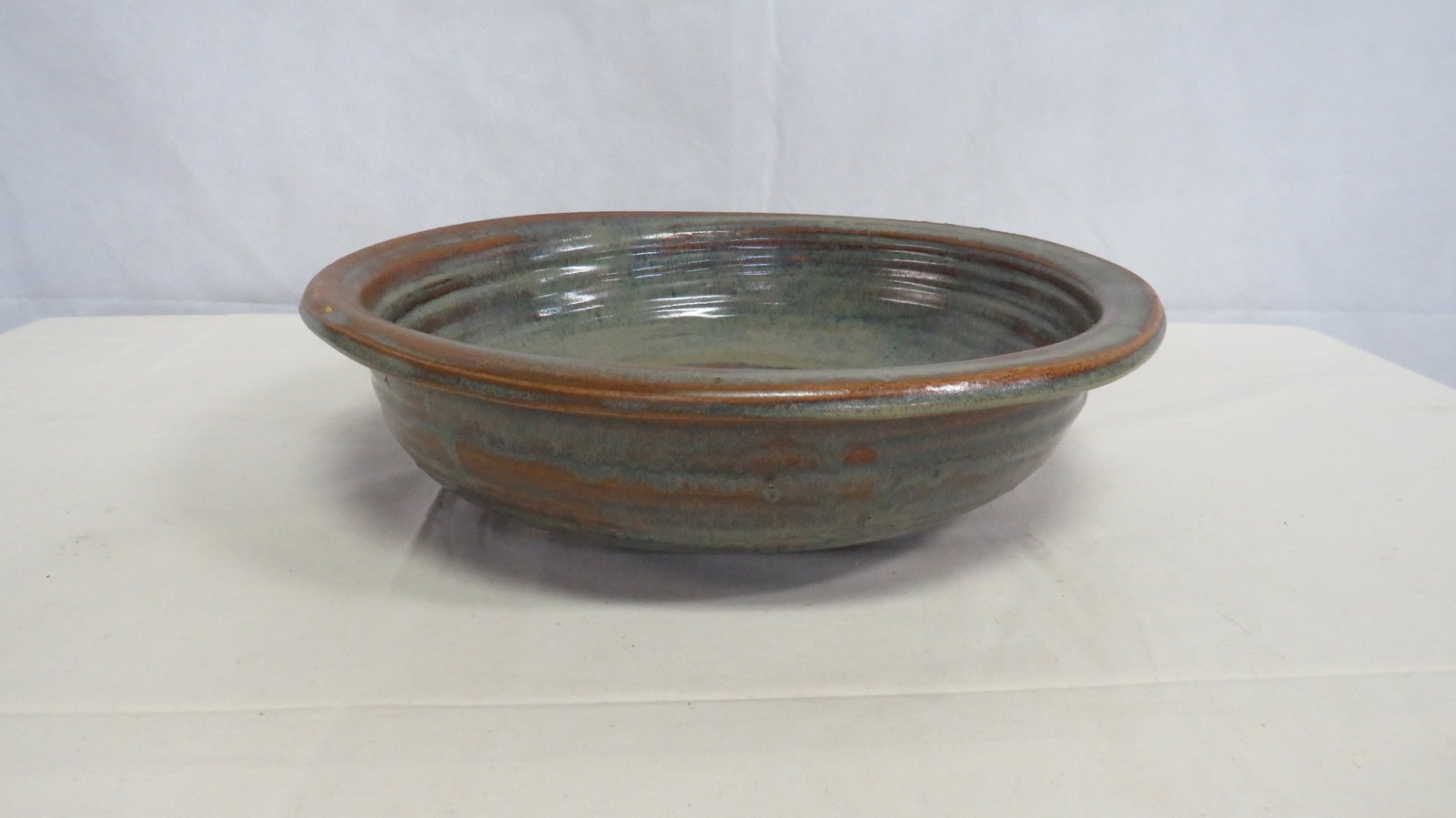 Vintage Large Studio Art Pottery Center Bowl: Vintage Large Studio Art Pottery Center Bowl in good condition. Artist signed. 3.75"H x 13.5"D