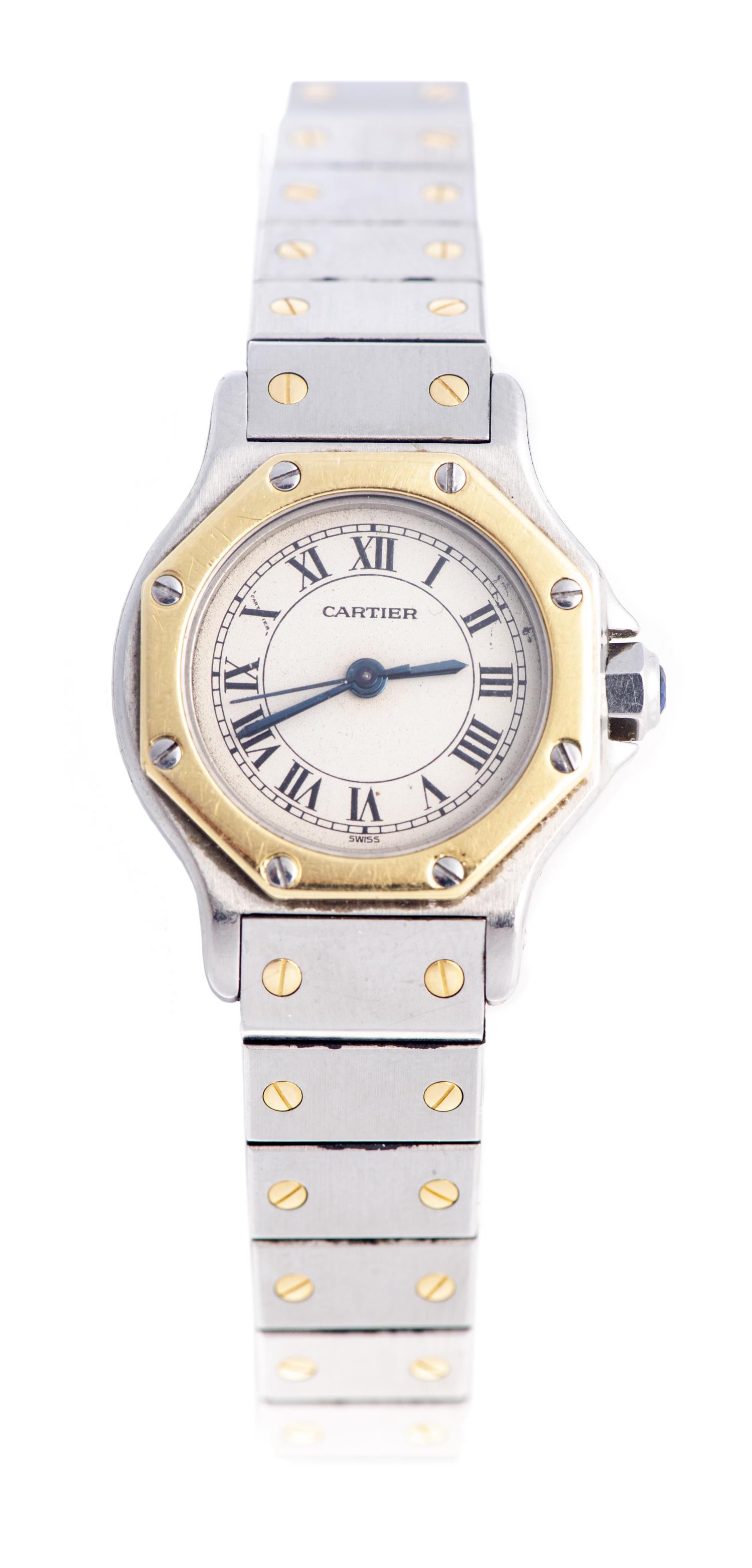Cartier, montre-bracelet modèle "Santos",: Cartier, montre-bracelet pour dame "Santos" octogonale en or et acier, bracelet Cartier en acier avec vis en or, cadran blanc signé Cartier, index noirs, aiguilles "bâton" en acier bleui, mo