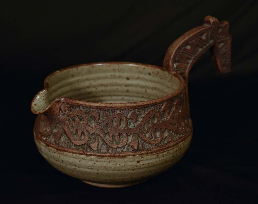 Molded Ceramic Pot w/ interior glaze: Molded Ceramic Pot w/ interior glaze shaped like a Norwegian Viking horse head