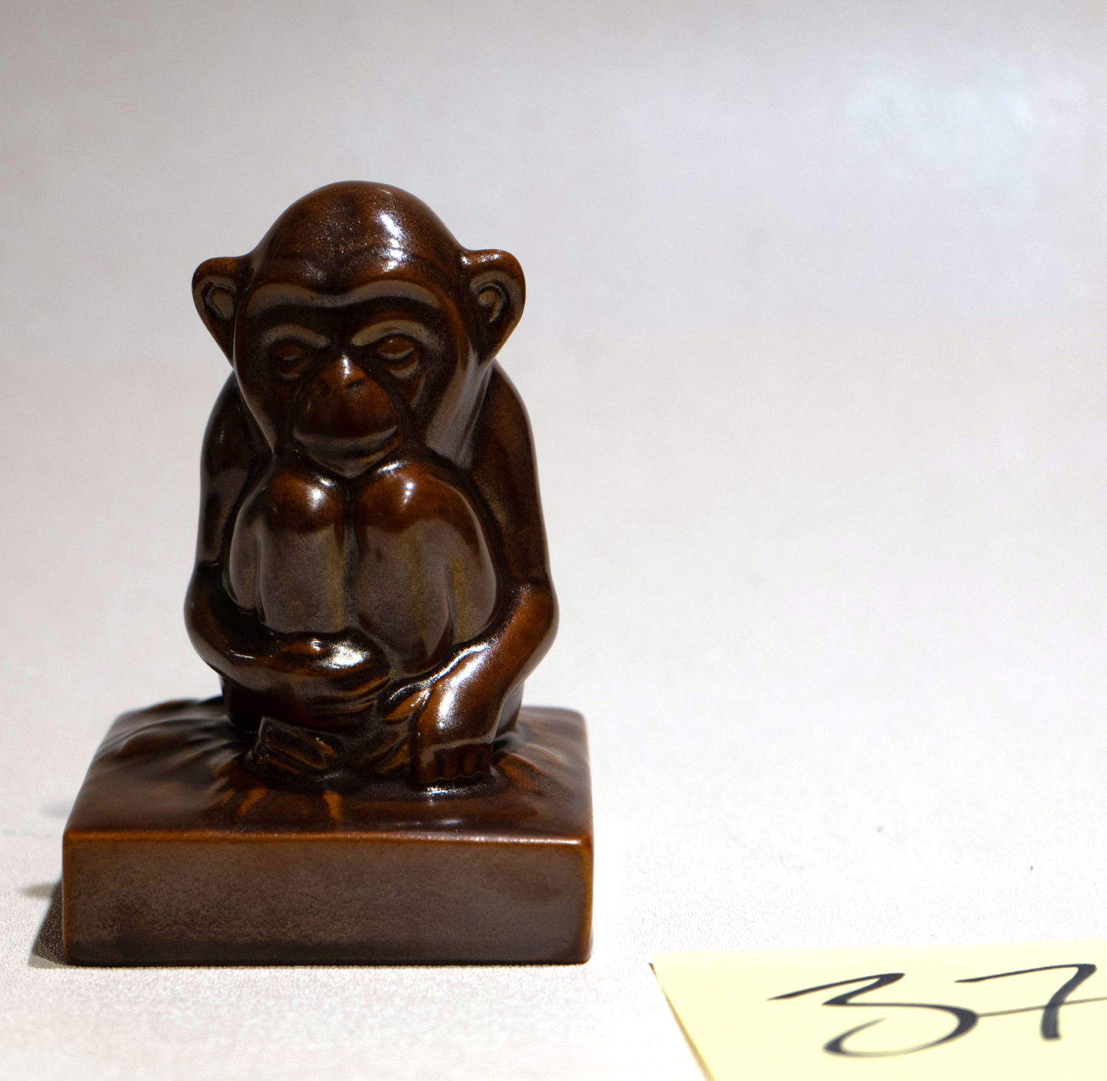 Roodwood Monkey: brown glazed ceramic Rookwood Monkey