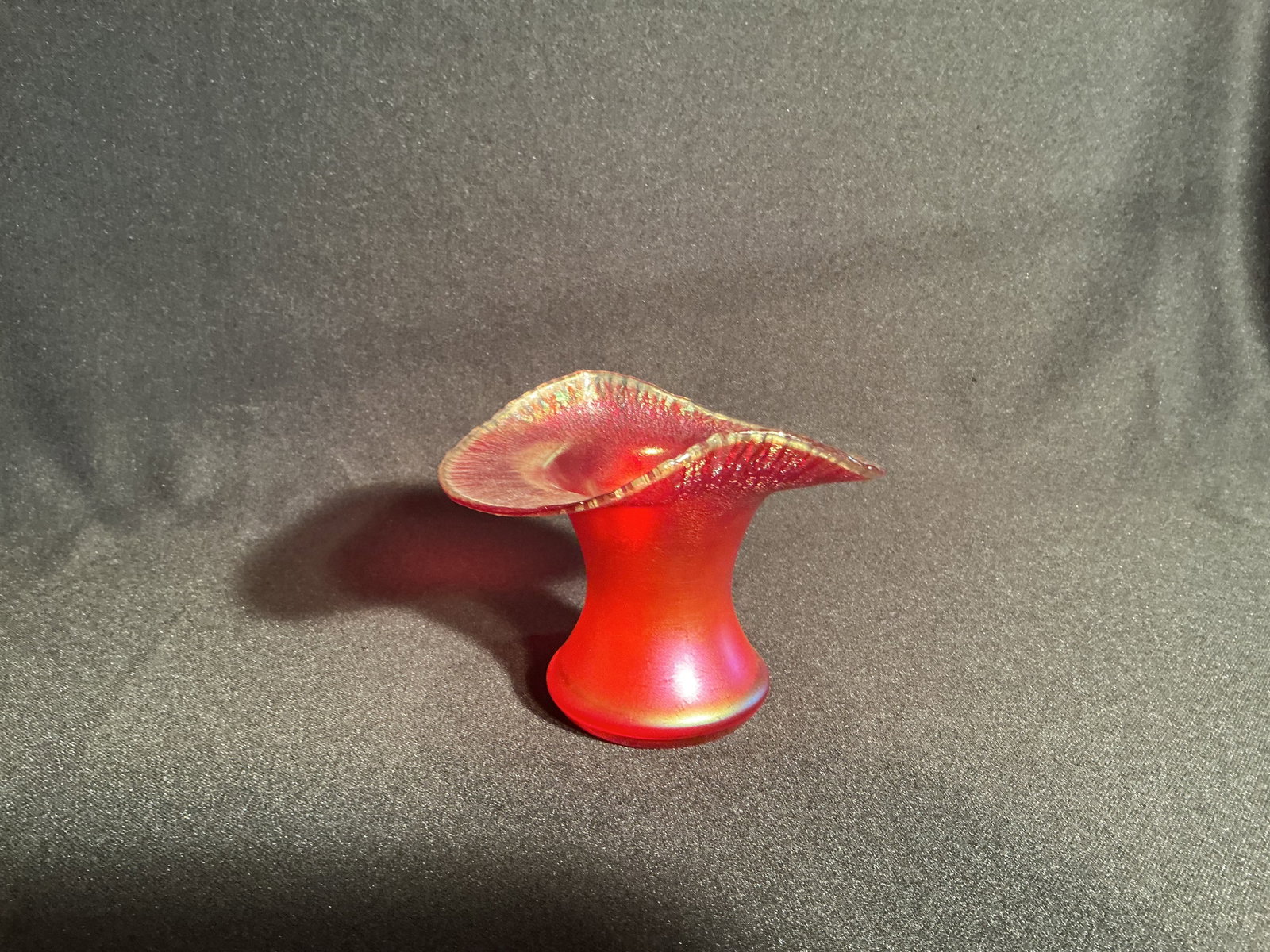 Orange Aurene Double Fluted vase: Unmarked. Hand-blown with deep orange body and gold edge highlights.