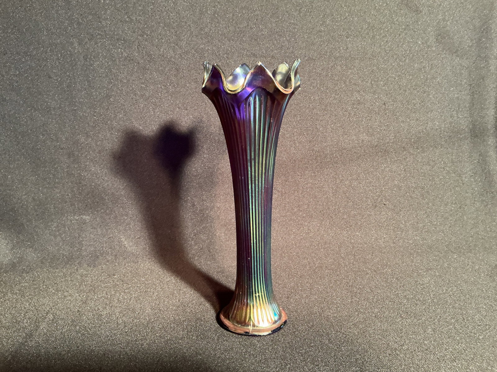 Amethyst Carnival Glass vase: Unmarked. Rich amethyst Carnival Glass Vase with vertical reeded design.