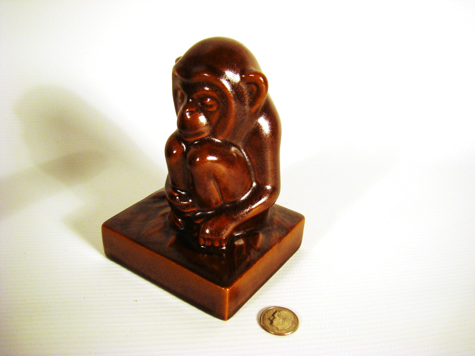 Rookwood Monkey Paperweight: Rookwood Monkey Paperweight in brown glaze with base. marked.