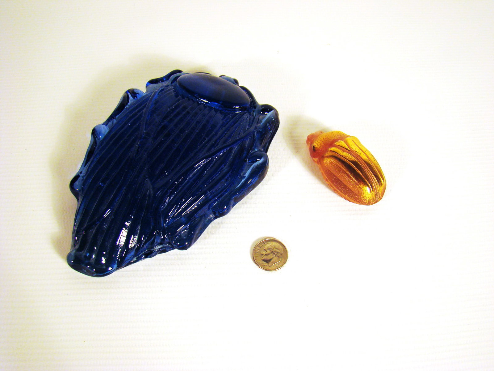 Lalique Scarab with blue glass Scarab paperweight: Lalique Scarab with blue glass Scarab paperweight. Marked Lalique France.