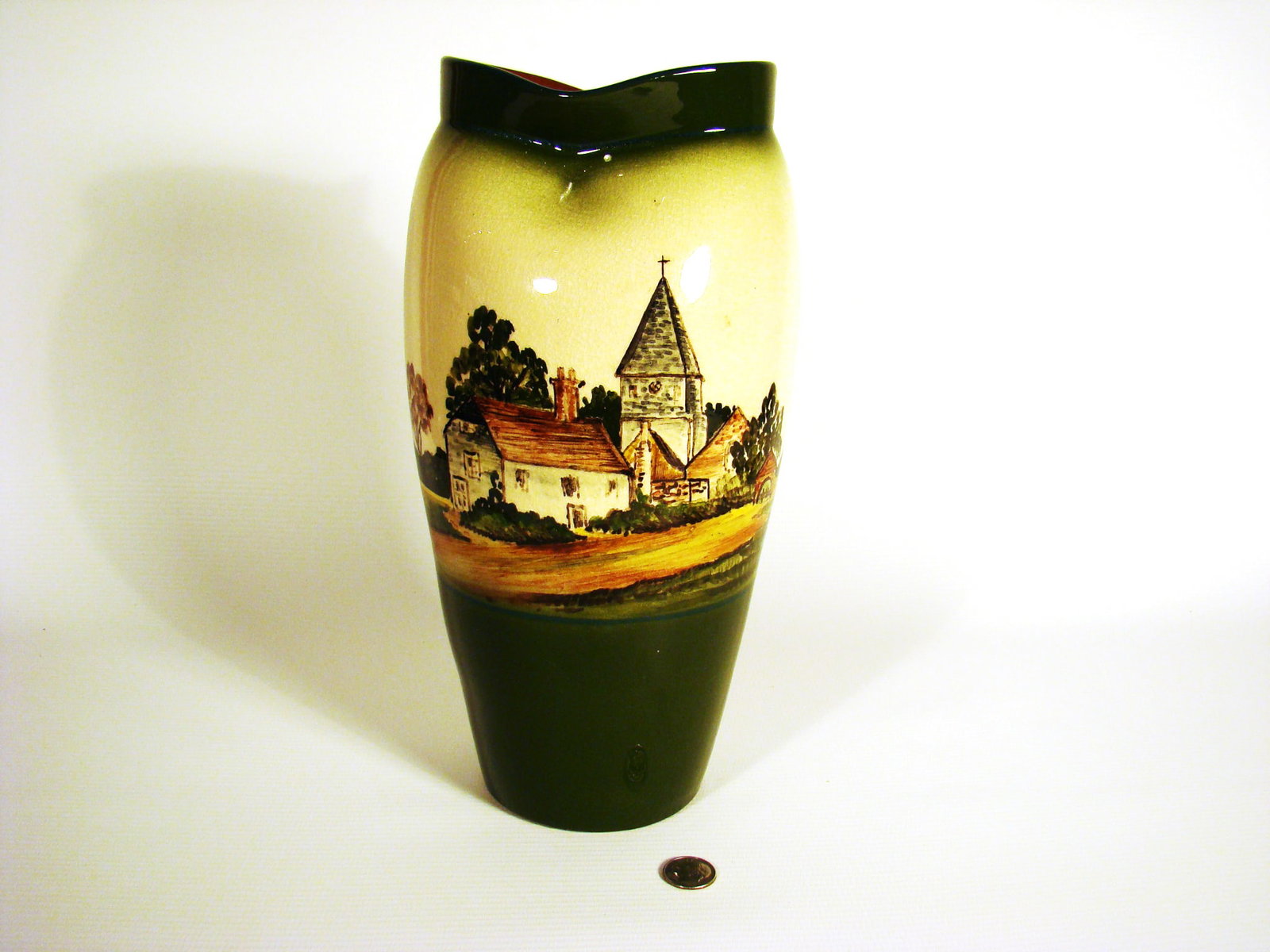 Watcombe Ceramic Scenic Vase: Watcombe Ceramic Scenic Vase with Church and landscape scene. Concave edge formed on top. "1551" marked.