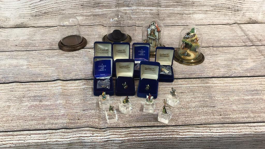 15 Goebel Miniatures: 2 In Dome Display Stands, 7 in Original Boxes, 6 miniatures on clear stands, 2 Dome display cases