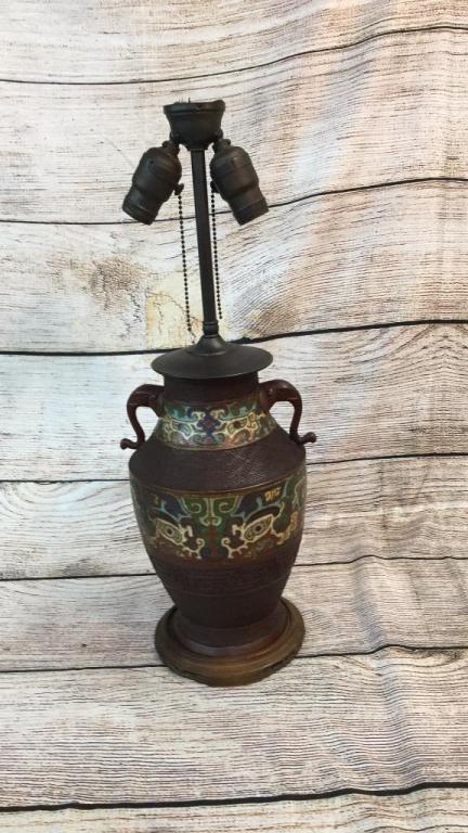 2 Champleve Lamps: One at 13 inches, bulbous Form with elephant head handles, mounted to wood base, other at 16 inches, missing one elephant head handle, metal base