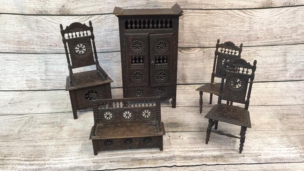 5 Pieces English Fret Carved Miniature Furnishing: Tall Wardrobe 16 x 7 w/ double doors pinched design to side panels, spindle gallery and doors...settle 10 x 8 w/ lift seat ..arm potty chair 14 x 6 w/ lift sear, 2 side chairs 11 x 5 ..some loss to se