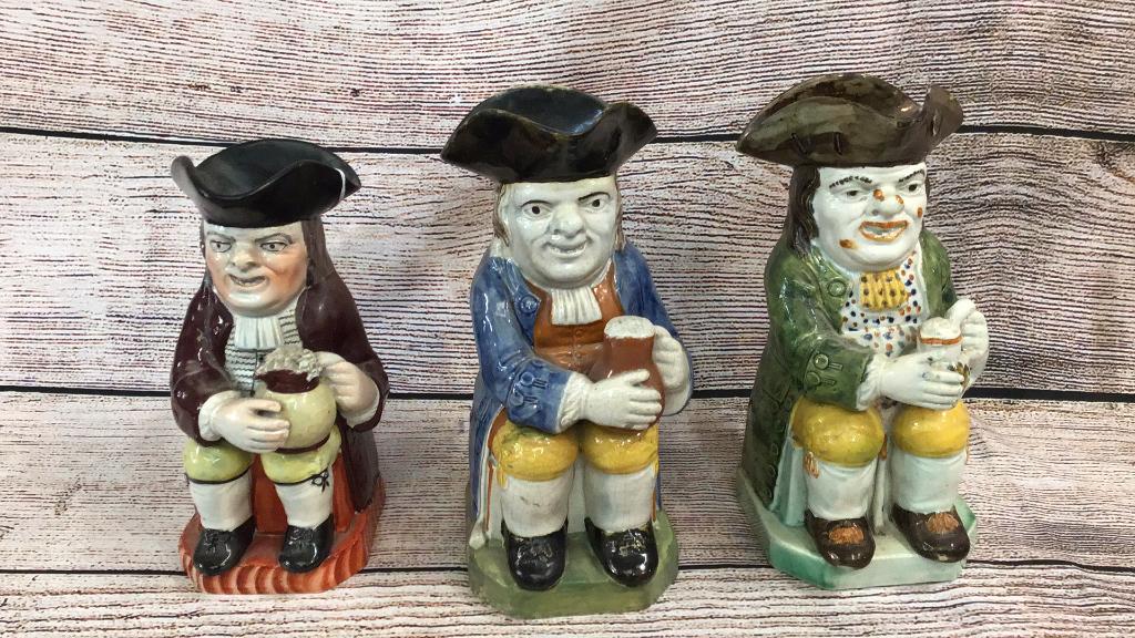 3 Earlier Toby Mugs: Hairline crack on blue coat, some minor rim chips and losses, 9 and 10 inches tall