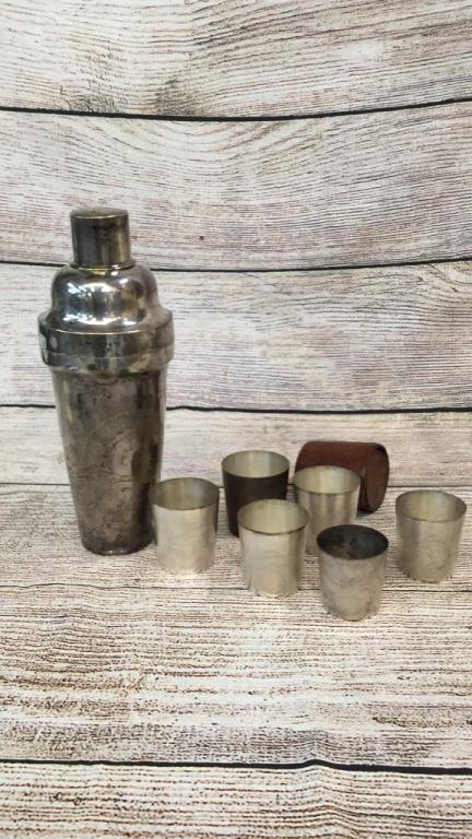 Dragon Etched Cocktail Shaker, Travel Shot: Tumblers .....Shaker is Silver? Or Silver plate, has faint stamp mark on base not discerned 11 inches tall, 6 piece set of tumblers are also etched with dragon designs, and stamped China on base with 