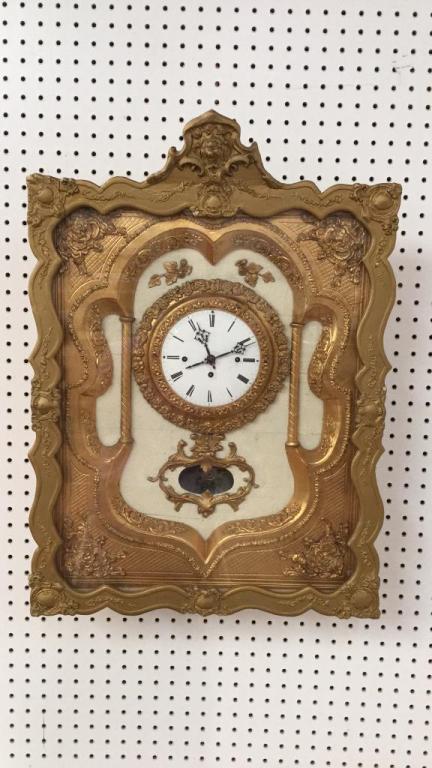 French Style Cased Wall Clock: Ornate Case with glass over frame...porcelain dial, 25 x 18
