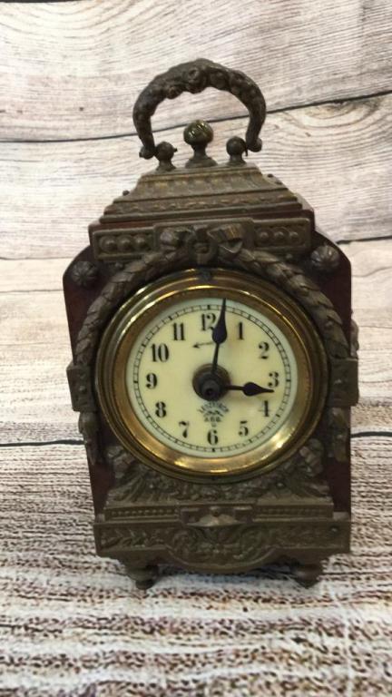 Antique German Lenzkirch Table Clock: Diminutive 6 inch wood case with Ormolu mounts, porcelain dial, winding alarm clock, brass back stamped with both winders, sits on4 brass feet...* we have not attempted to wind this clock