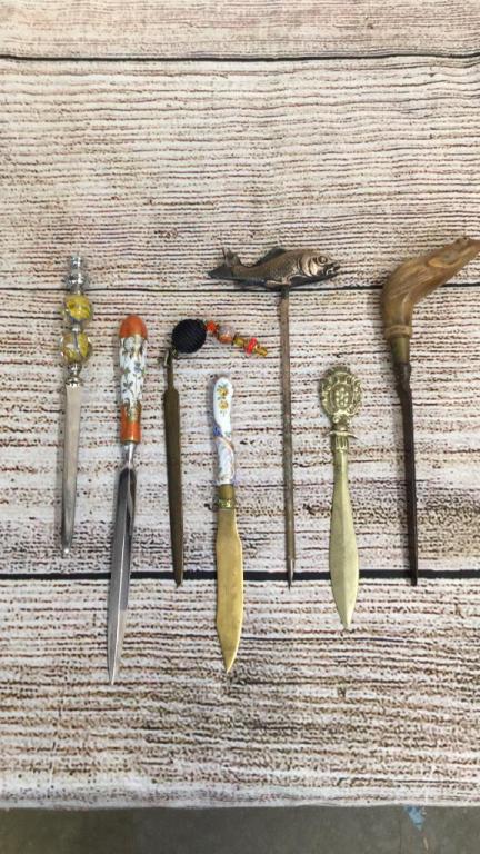 7 Antique Letter Openers: Porcelain handle marked Sheffield, brass sword marked Italy, unusual Fish topper is marked H. France, hard stone Carved Frog