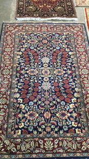 2 Oriental Carpets: 3 x 5 red and blue ground, with animal figures and gul borders, 4 x 6 navy ground repeating center design trees and flowers