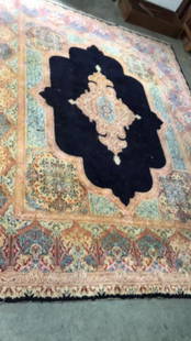 9.5 x 12 Designer Oriental Are Rug: Reds, cream & blue, some staining, see photos