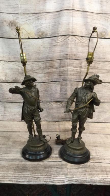 Pair Antique Spelter French Musketeer Lamps: 30 Inches Tall To Finial...mounted On A Black Metal Round Base, Both Holding Swords..appear In Good Condition Just Need Cleaning
