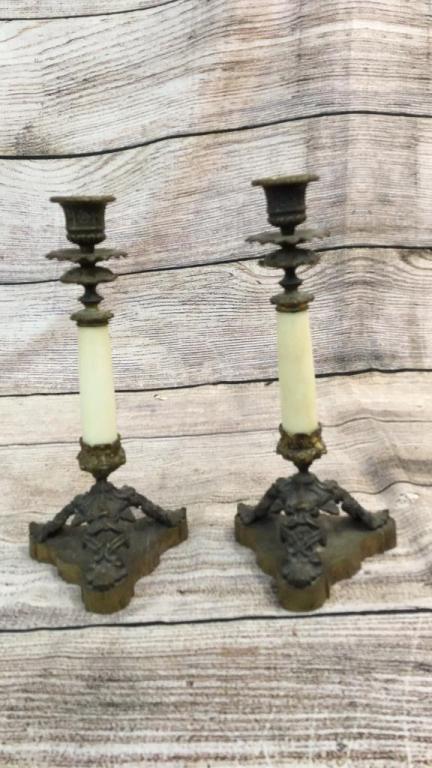 Pair Grand Tour Alabaster Candlesticks: 12 inches tall...alabaster columns mounted on tri foot base with foliage designs...drip cups, no marks