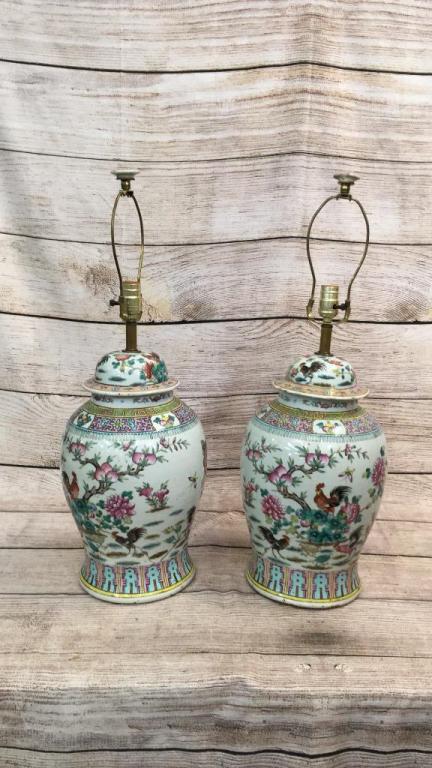Pair Famille Porcelain Urn Lamps: 29 inches to finial....multiple painted and enameled designs of roosters, peach trees, florals and butterflies...peach, teal and pink on white ground* minor wear and staining