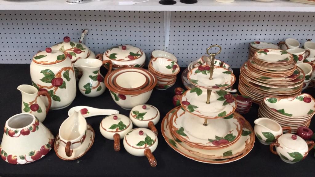Large Collection of Franciscan Apple China: Approximately 178 pieces including serving pieces...cookie jar, tid bit tray,, soup tureen, napkin rings, shakers, platters, plates, bowls, tumblers, sherbets, bone dishes, candle holders cup sets, go