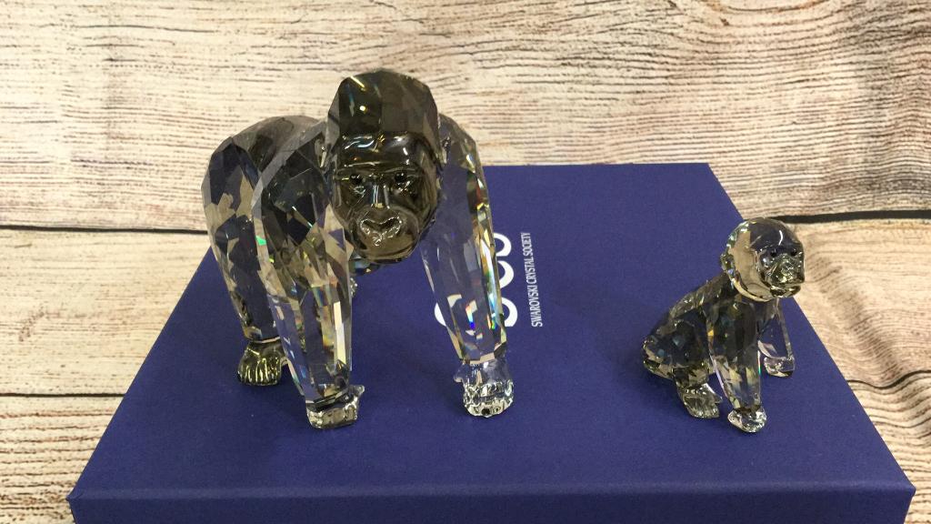 Swarovski Endangered Seriers Gorillas: Mother is 5 inches ..baby is 2 inches tall...produced in 2009 these are replicated in Swarovski Black Diamond..with original box