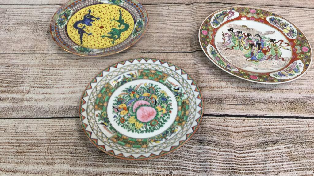 3 Asian Porcelain Plates: 9 1/2 inch Famille plate with birds and butterflies, 10 inch plate with enamel and gilding....9 1/2 inch dragon plate yellow central ground ...no chips or hairlines