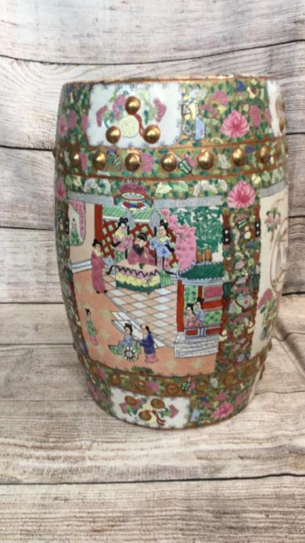Famille Rose Porcelain Garden Stool: 18.5 x 12. 75 inches..traditional barrel form..pierced apatures...decorative designs of courtyard scene