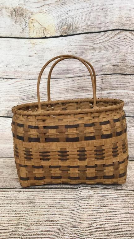 Cherokee Split Oak Purse Basket: 10 x 12 inches...fixed carved handles, walnut and butternut dyed weavers...tightly woven, wrapped rim* slight fading consistent with age
