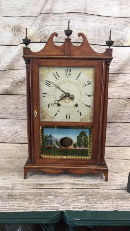 Pillar and Scroll Shelf Clock: Reverse Painted Lower Door, Metal finials, has pendulum and weights....line 88