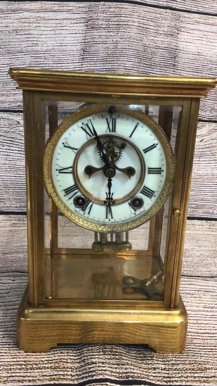 Ansonia Mantle clock: 9.5 tall x 6.5 wide x 5.5 deep with key Porcelain dial, Metal & beveled glass case, operable nut not tested to keep time