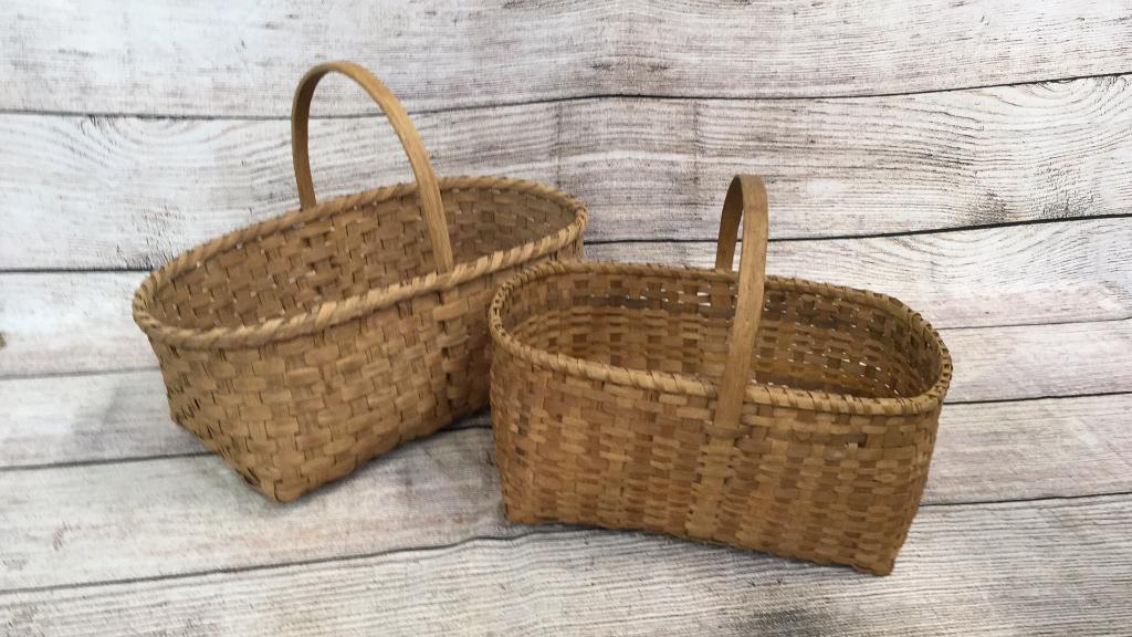 2 split oak Garden Baskets: 19 x 10 and 15 x 10 inches, both bentwood handles...smaller basket has older patina...both w/ age wear