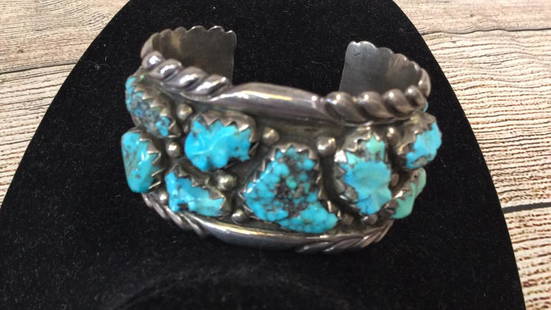 Zuni Cuff Bracelet: Wide Cuff Bracelet 1/12 inches, with 14 Turquoise stones, inside stamped Zuni...also initials EMY....* please note stones and metals are not tested......line 27