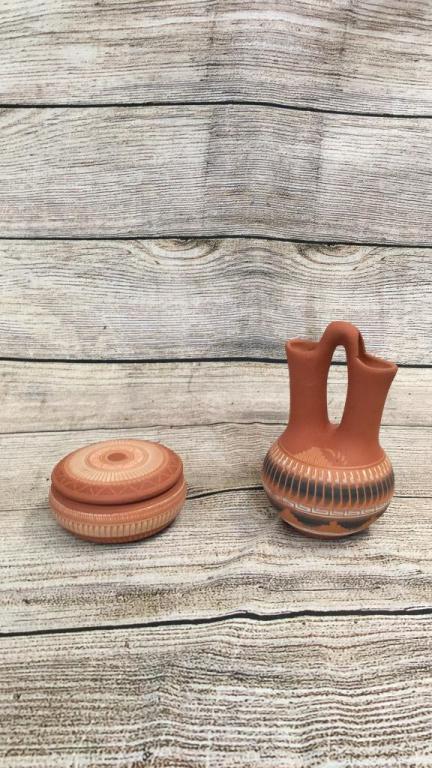 2 Pieces Southwestern Pottery: Navajo Wedding Vase 7 inches tall, signed EJ..decorated with prayer feather design.....and a Michael Charlie round covered dish....Navajo?..line#44,50