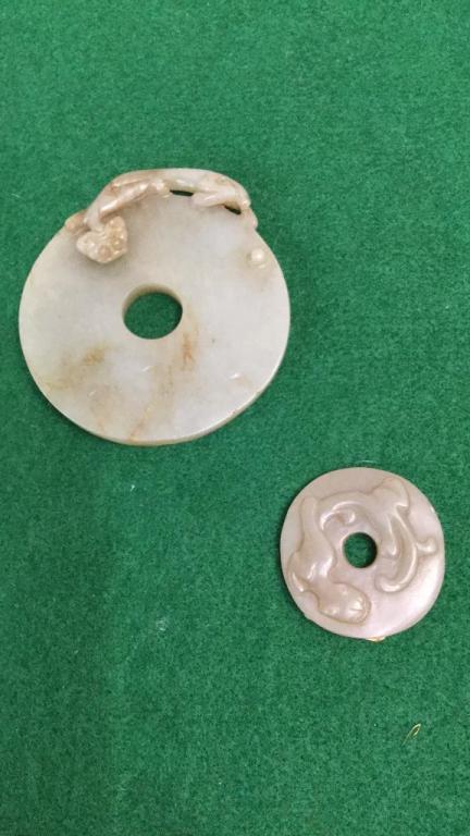 2 Carved Jade Bi: 3 1/2 inch with Dragon, stippling to back...smaller 1 3/4 inch disc with dragon..possibly Han dynasty....