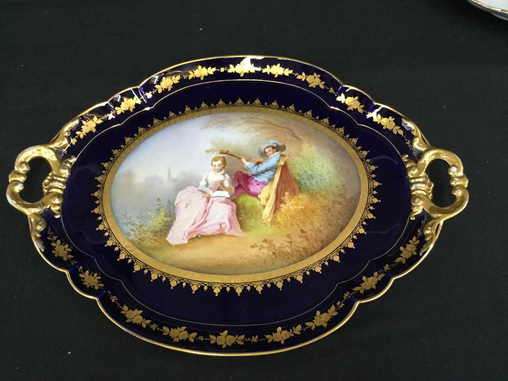 Sevres Platter, Portrait Plate: 9 inch plate is hand painted and signed Gaultiers...reverse mark identified as 1779..Madame Royale...18 inch platter with deep cobalt ground, pictorial of couple in meadow....heavy gilting...reverse