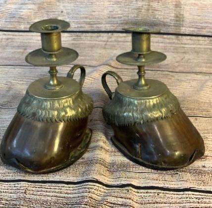 Pair Horse Hoof Candlesticks: With engraved tag for Jack, Dec 1888...7 inches tall, hooves with horse shoes..brass cuffs, and candle mounts...loop handles. line 22...* slight bent candle cup...
