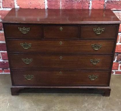 English Edwardian Mahogany Chest: Bracket feet, banded and dovetailed drawers, bail pulls, splits in side and top see photos 37 tall x 48 wide x 21 deep