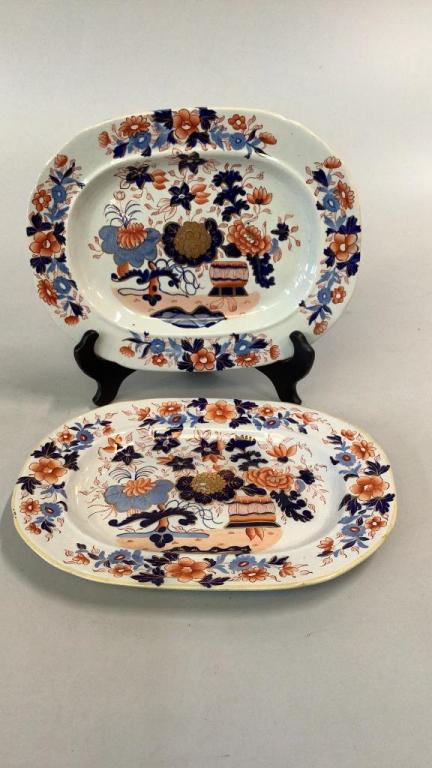 Pair Antique Imari Cabinet Plates: 10 3/4 inch oval plates....with bright colors... Floral decoration to center and rims...cobalt and Rust with Gilt trims..#53
