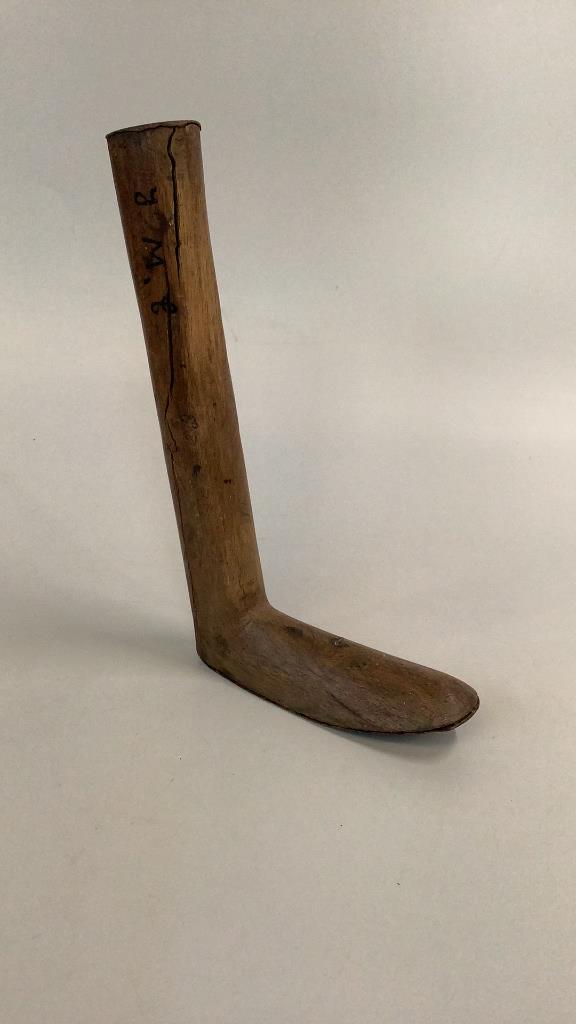 Boot Form? Prosthetic Leg?: 16 inches tall with a 9 inch foot..wood with a tin cap at top and on the footbed…* crack runs length