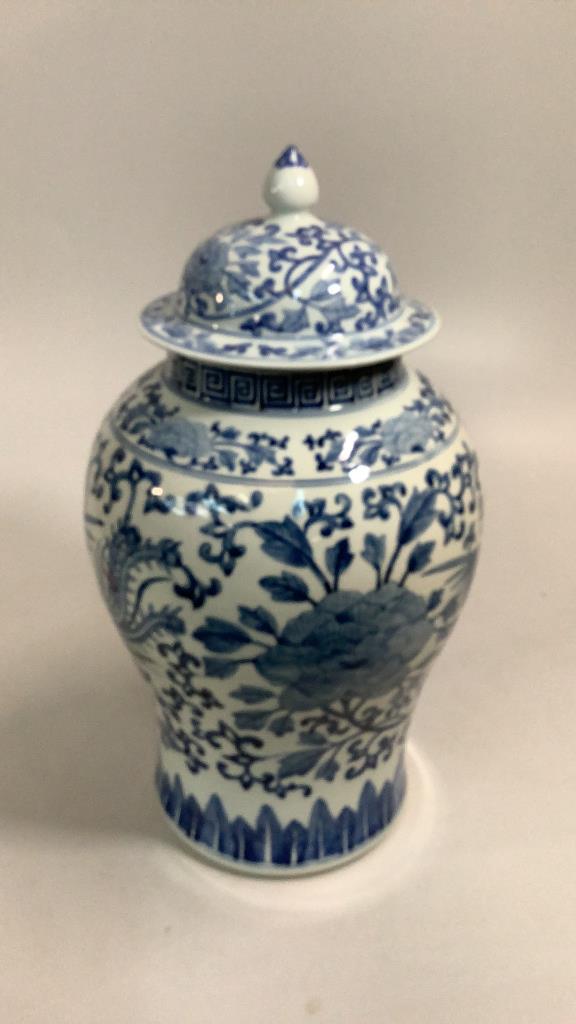 Chinese Porcelain Temple Jar: 17 inch lidded jar in traditional form, blue and white with Flying Phoenix at body, repeating florals to lid and shoulders…nice condition, no marks #56