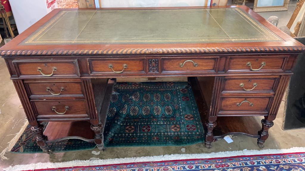 Mahogany Hobbs & CO Lawyers Desk: Paneled ends, carved accents, leather top, 30 tall x 60 wide x 33 deep